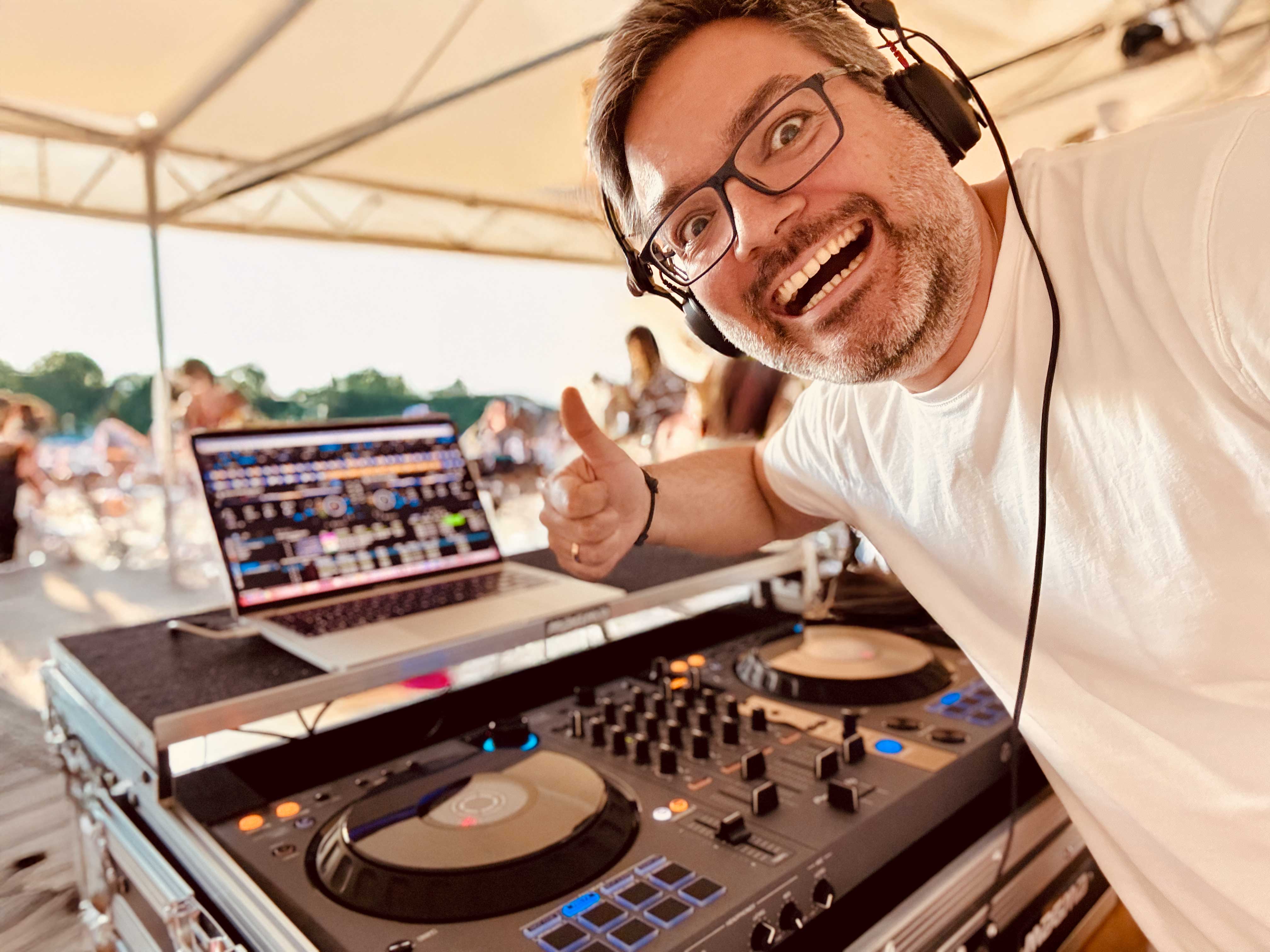 Photo of DJ Q-Kat performing live